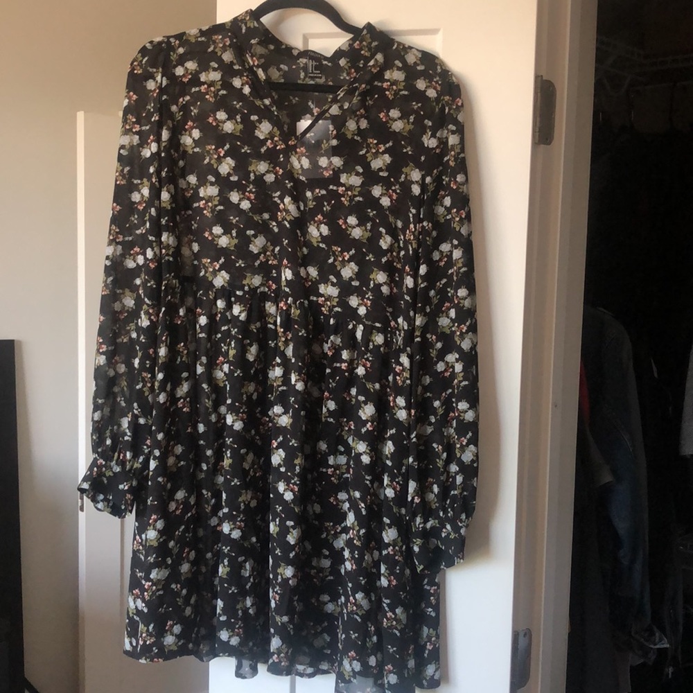 Black floral baby doll dress from Forever 21. Never worn w/ tags still attached